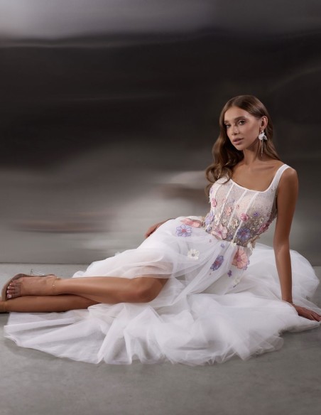 Long white wedding dress with floral embroidered bodice