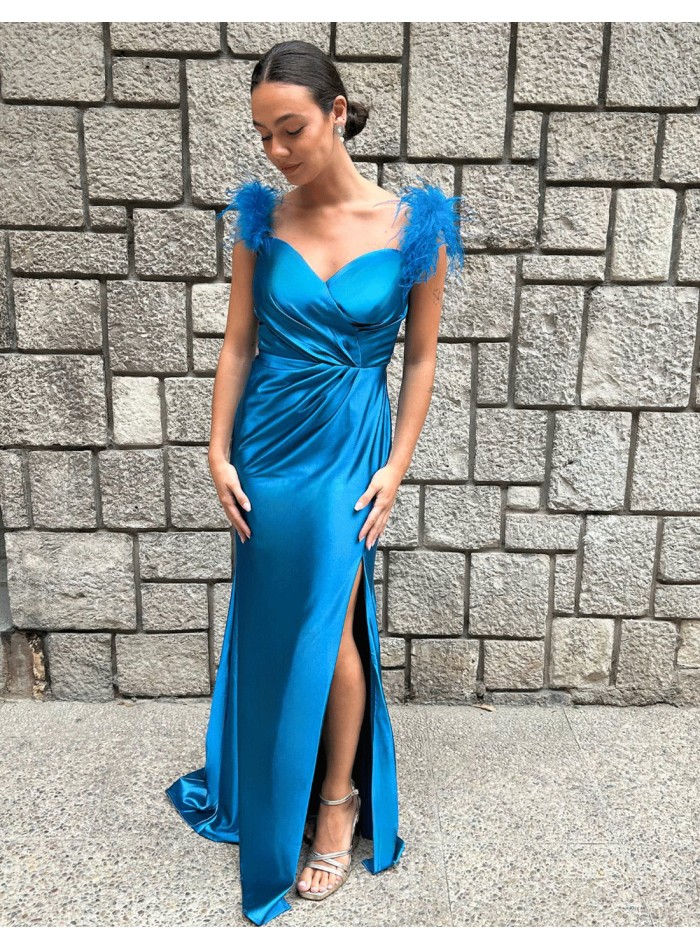 Party dress for guest with feathers on the...