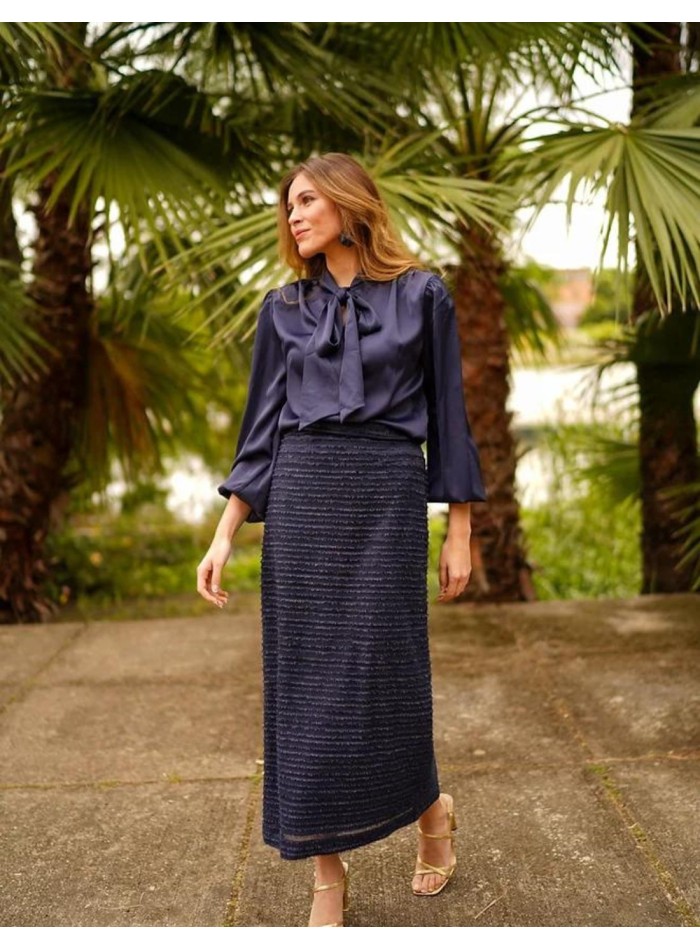 Navy blouse with shoulder pads and V-neckline