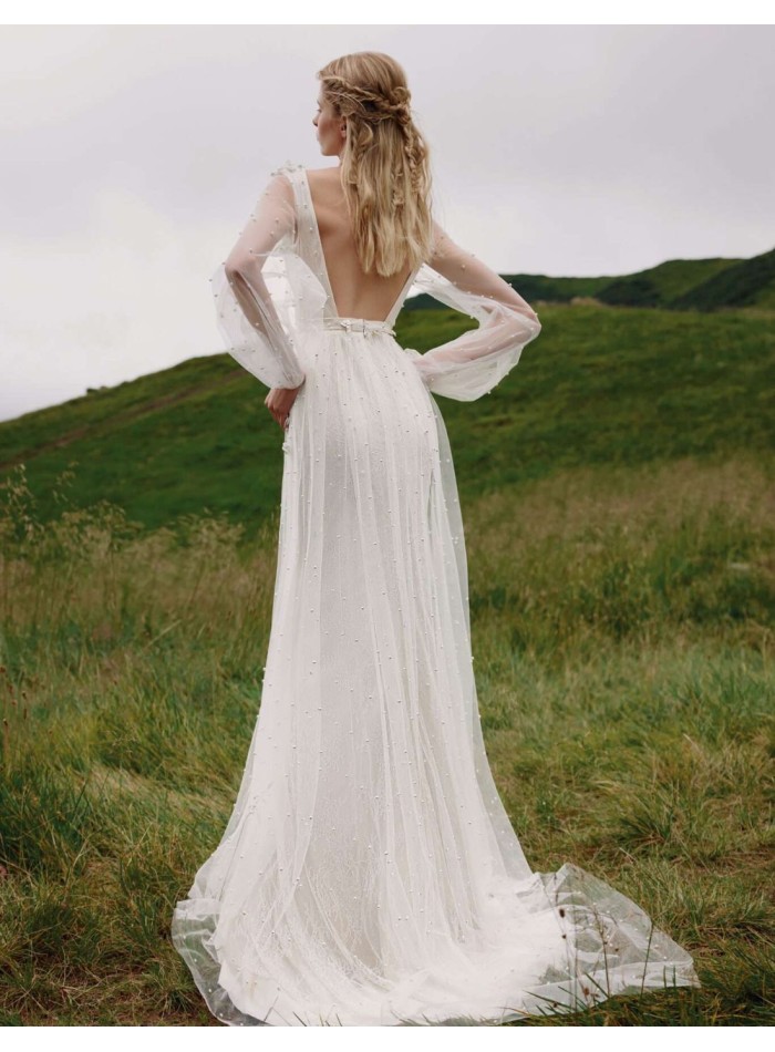 Vestido de novia largo con espalda descubierta...