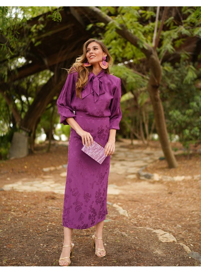 Purple blouse with shoulder pads and lacing