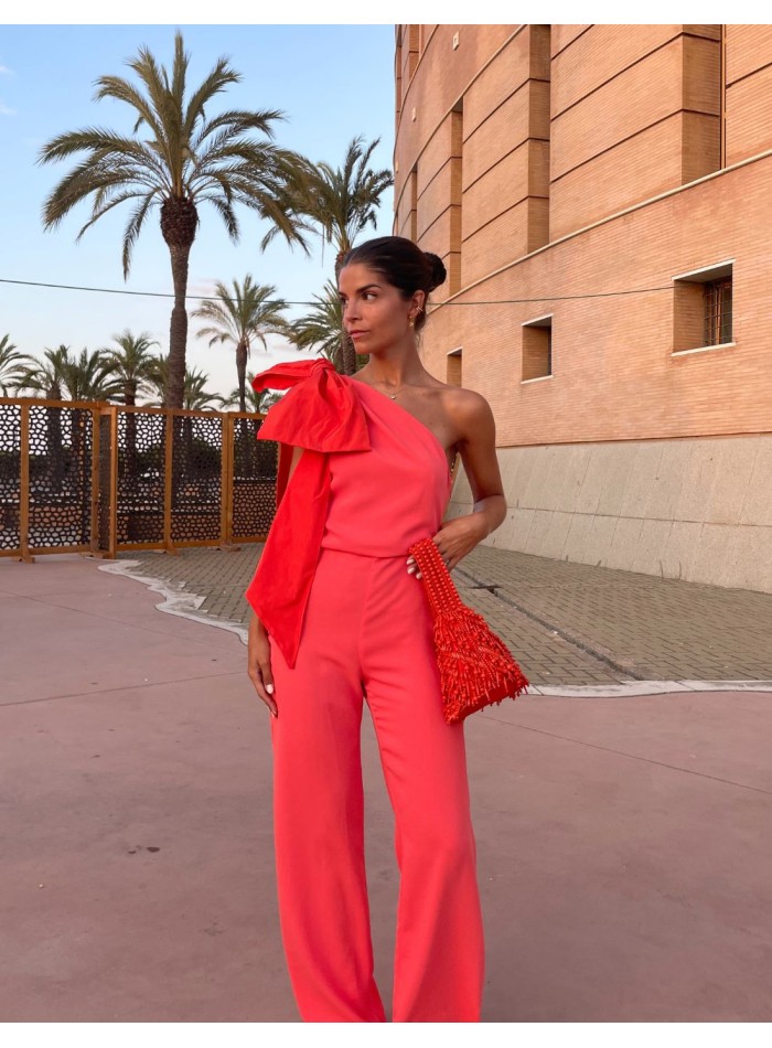 Long orange jumpsuit with bow on the shoulder INVITADISIMA