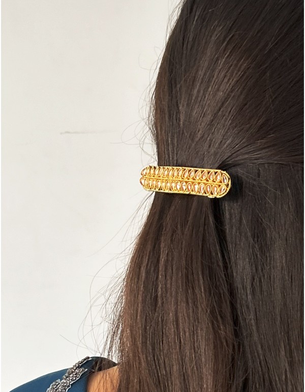 Golden barrette with pink crystals in the shape of leaves 2