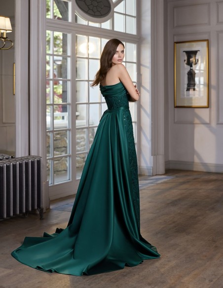 Long party dress with asymmetrical neckline and detachable train