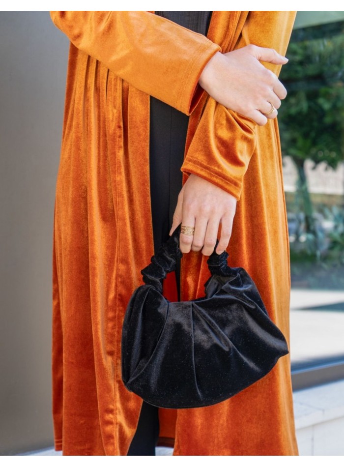 Bolso de mano arrugado en terciopelo