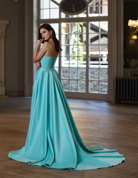 Robe de bal longue avec boléro, corset drapé et surjupe amovible