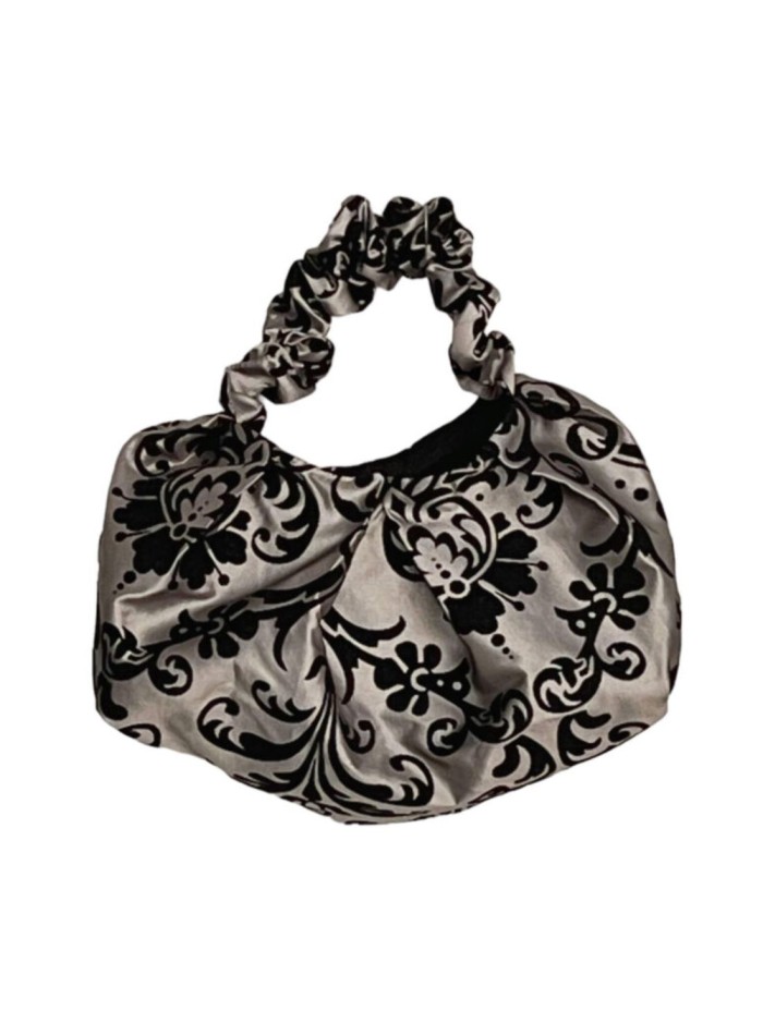 Ruffled party bag in printed taffeta
