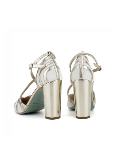 Chaussure à talon large en finition métallique avec brides croisées