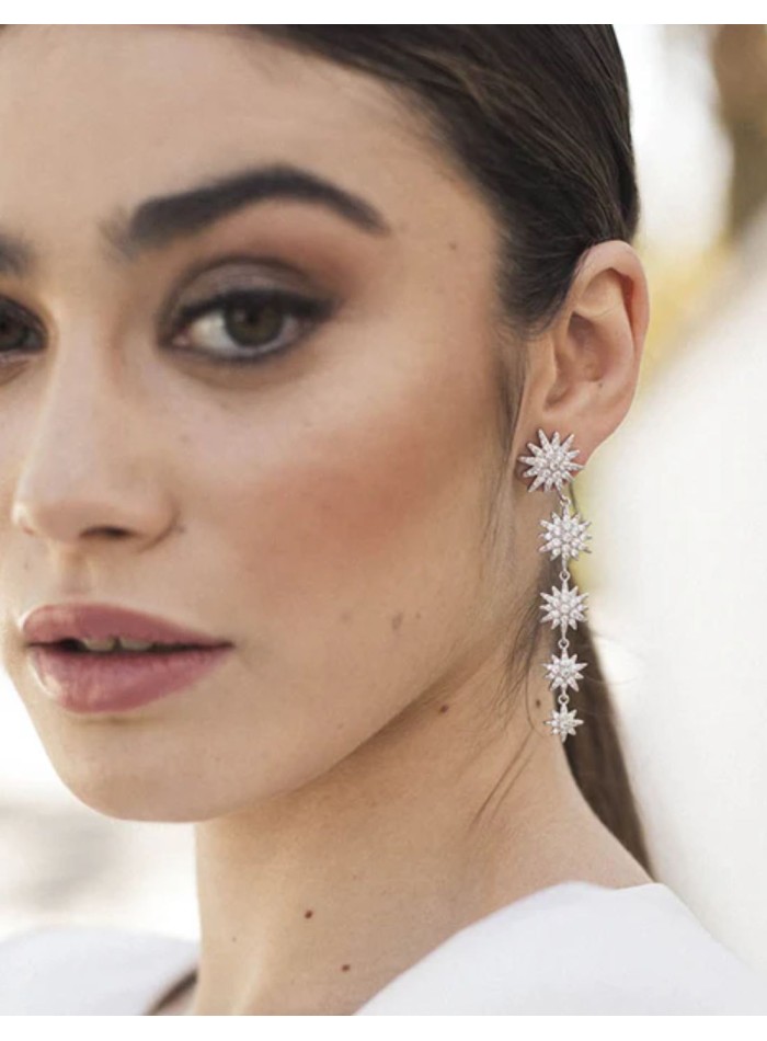 Long party earrings with five stars