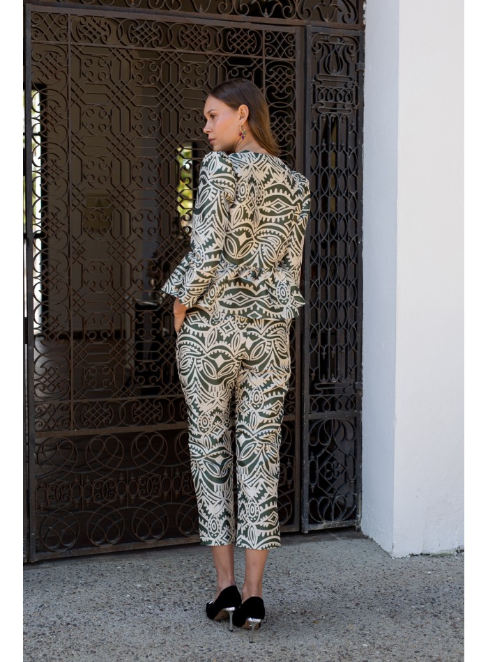 Party blouse with peplum ruffle and puffed sleeves