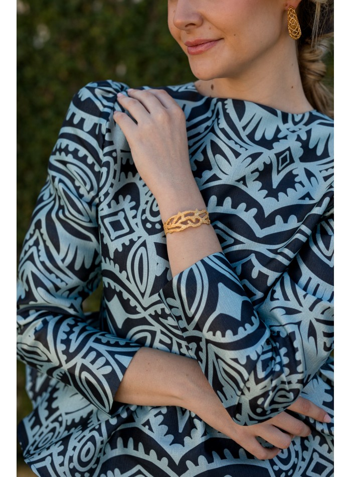 Party blouse with peplum ruffle blue print