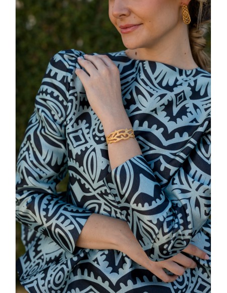 Party blouse with peplum ruffle blue print