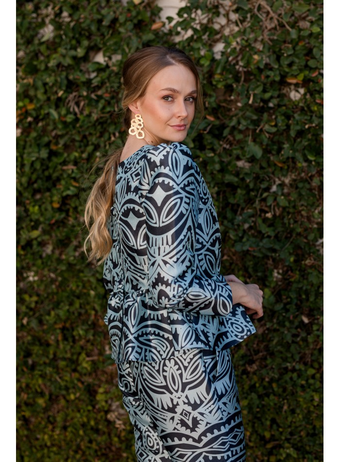 Party blouse with peplum ruffle blue print