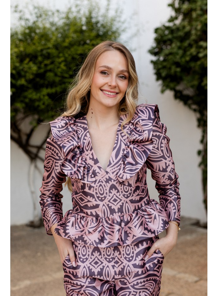 Pink printed blouse with peplum neckline and frill