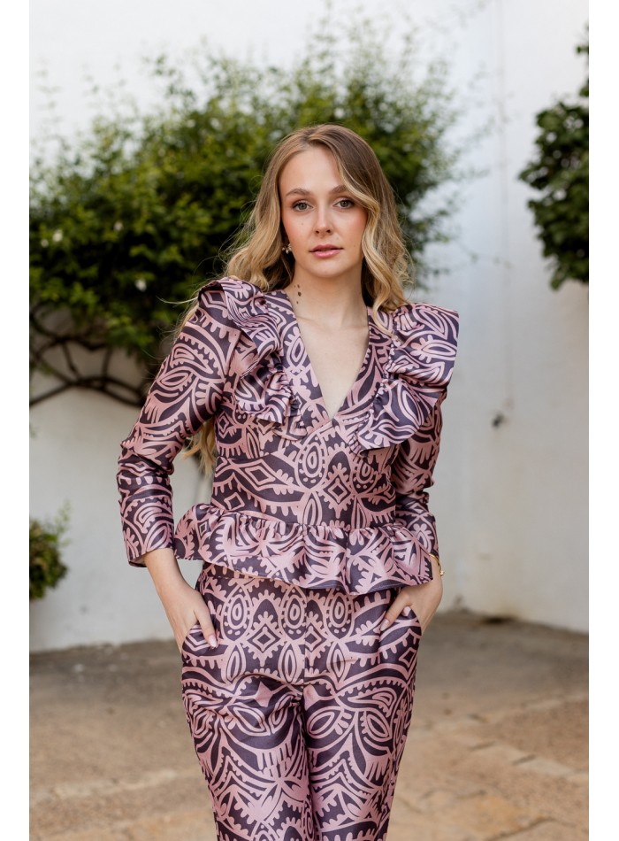 Pink printed blouse with peplum neckline and frill