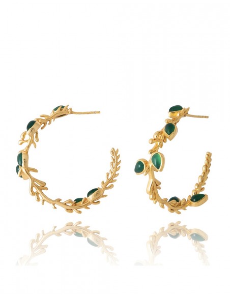 Golden ring earrings detailing leaves and branches with green stone