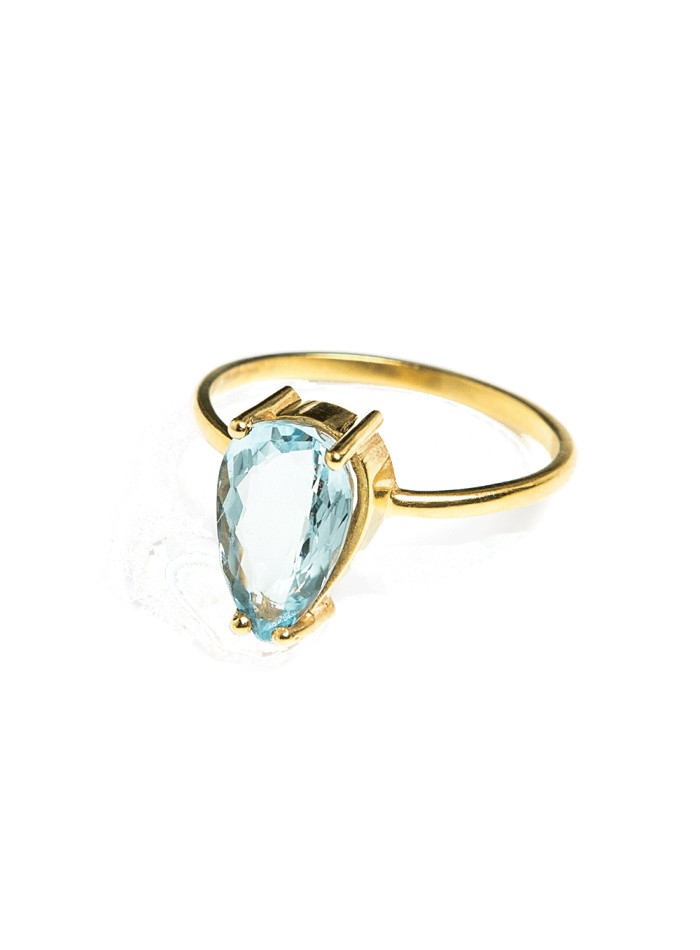 Golden ring with natural stone in the shape of an aquamarine drop