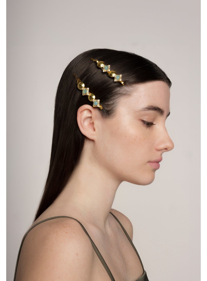 Horquilla dorada con piedras