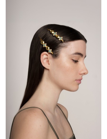 Horquilla dorada con piedras