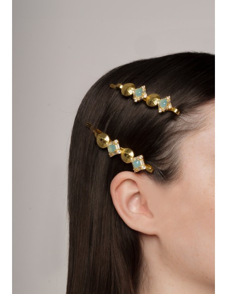 Horquilla dorada con piedras