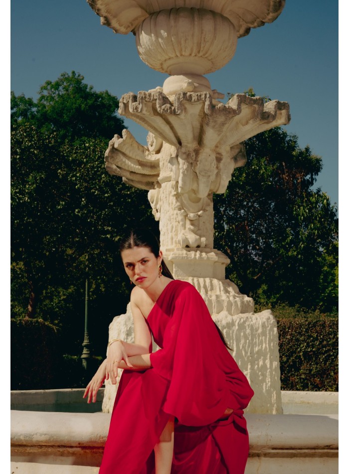 Pendientes dorados forma ojo naranja con piedra