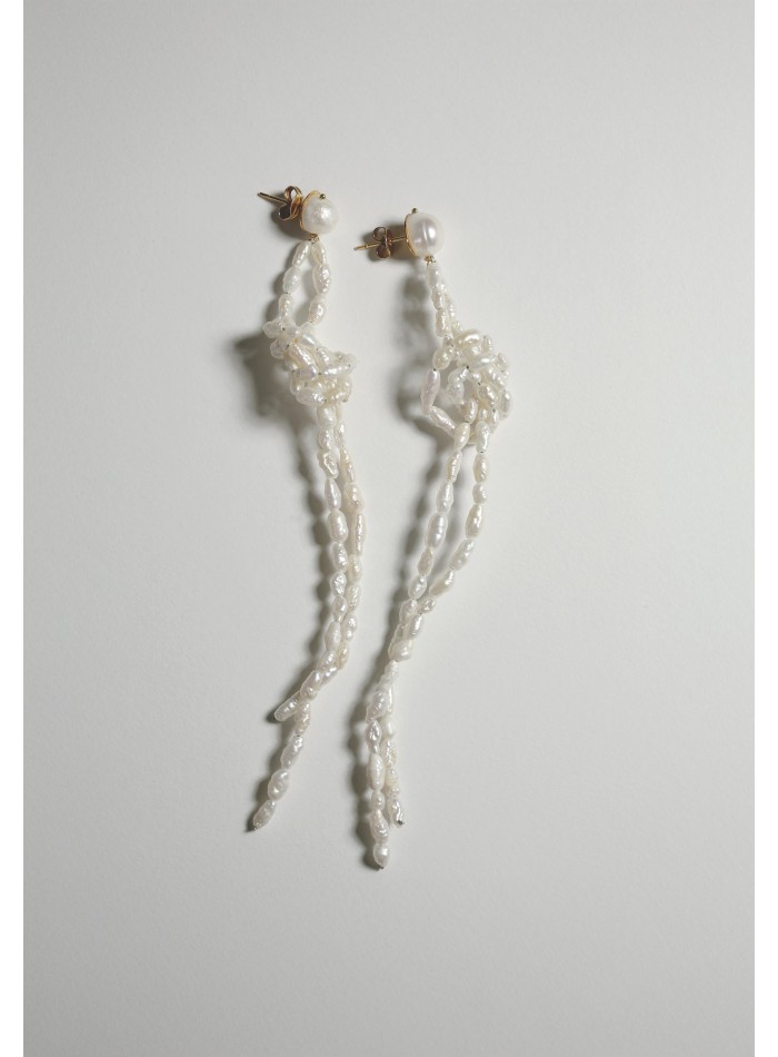 Long pearl earrings with knot