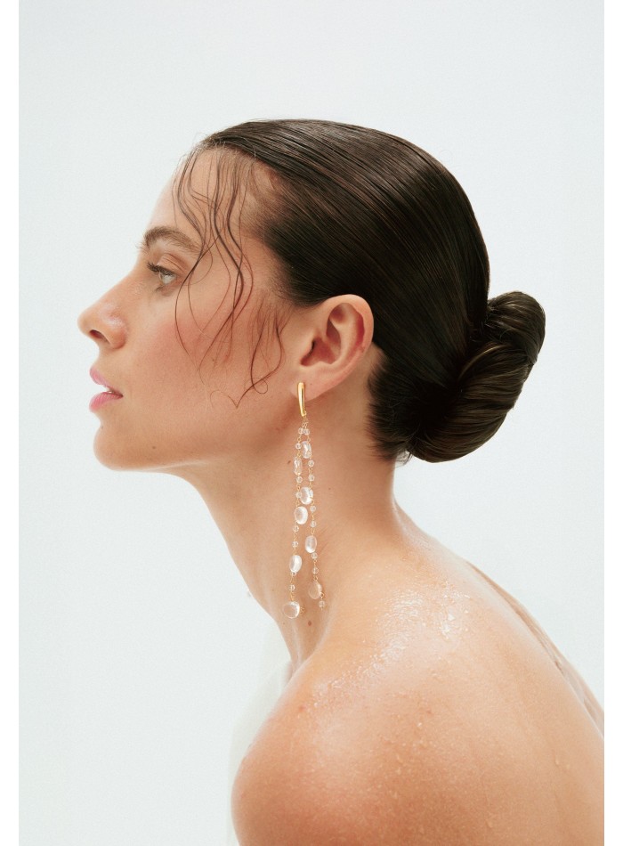 Long golden earrings with crystals