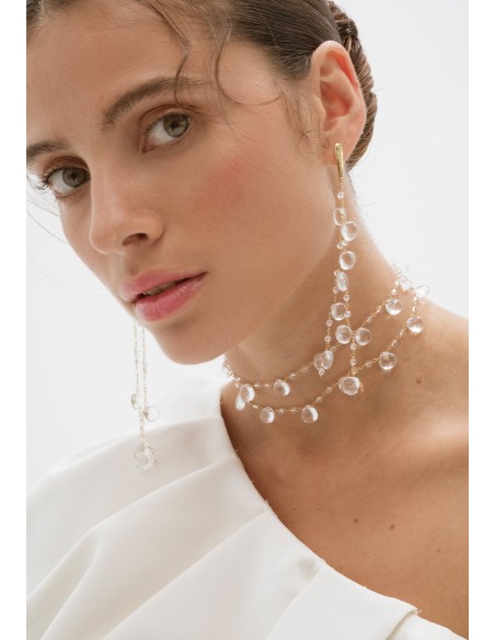 Long golden earrings with crystals