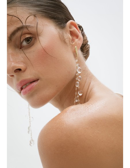 Long golden earrings with crystals