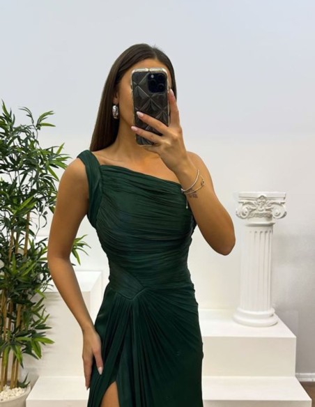 Long pleated party dress with asymmetrical neckline