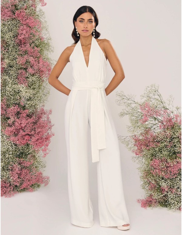 Wedding jumpsuit with bow at the waist and halter neckline