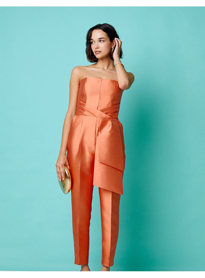 Long peach party jumpsuit with strapless neckline