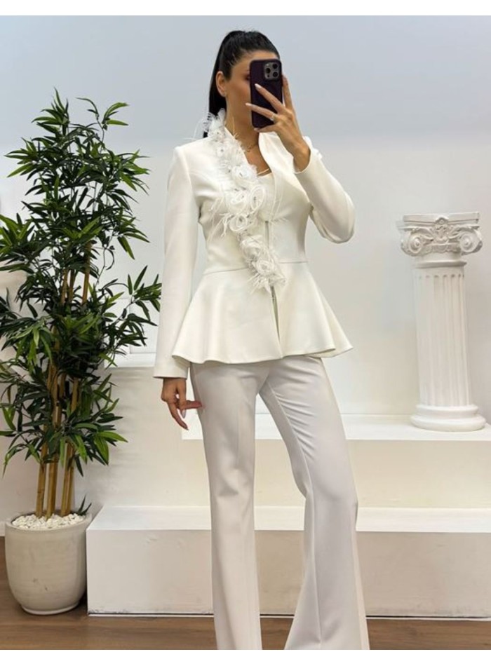 Two-piece suit with ornamental jacket and long bell-bottom pants