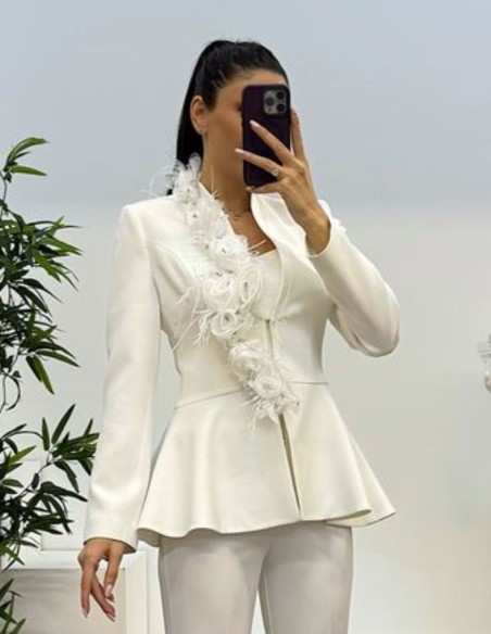 Two-piece suit with ornamental jacket and long bell-bottom pants