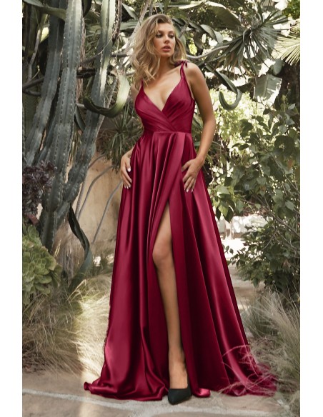 Evening dress in satin with crossed neckline and slit
