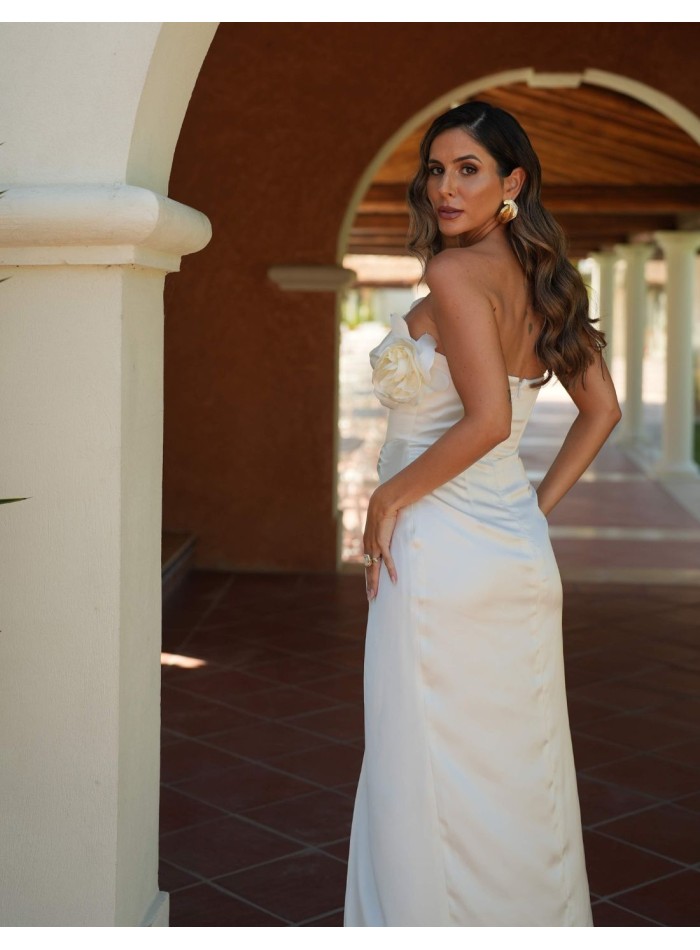 Long white dress with side opening and flower...