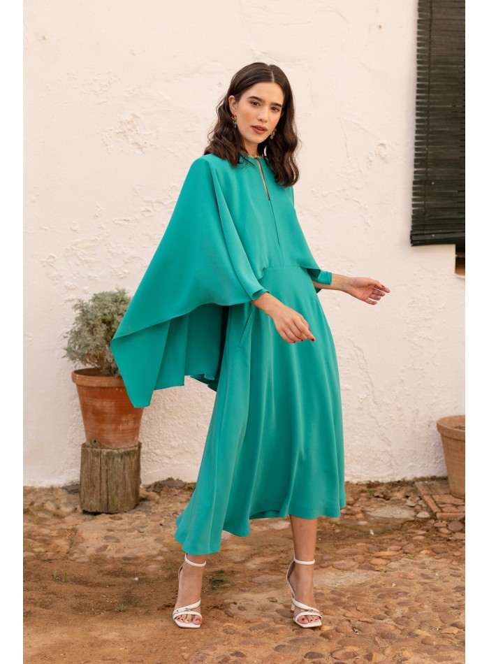 Turquoise midi dress with asymmetrical cape