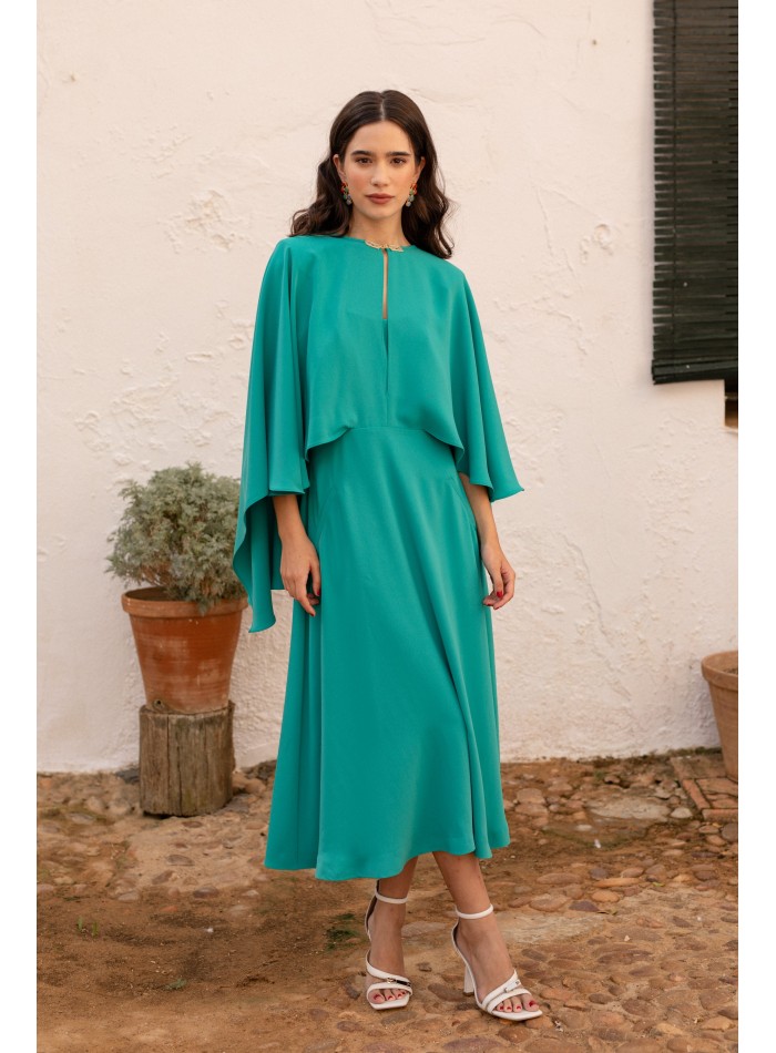Turquoise midi dress with asymmetrical cape