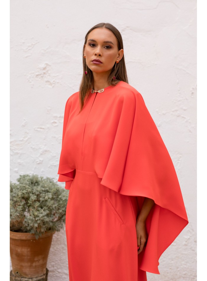 Coral midi dress with asymmetrical cape