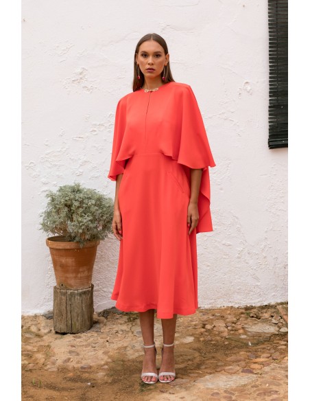 Coral midi dress with asymmetrical cape