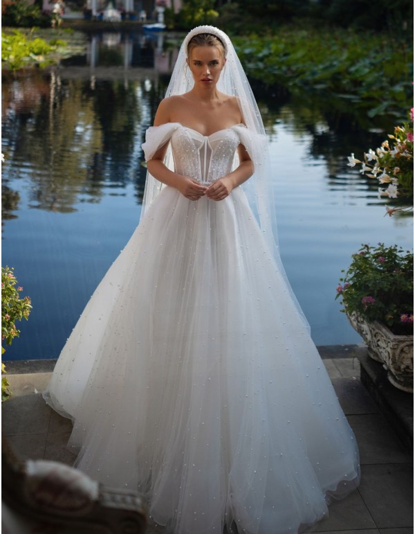 Vestido de novia marfil con mangas caídas