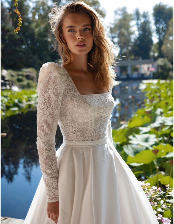 Vestido de novia marfil con manga larga de encaje