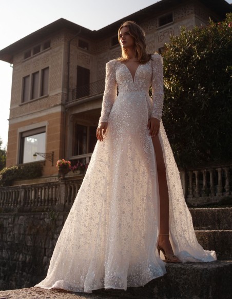 Vestido de novia marfil en encaje y pedrería