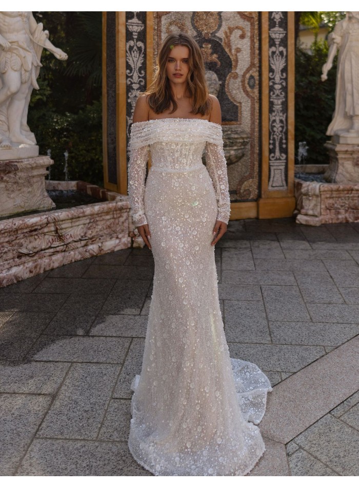 Vestido de novia en pedrería con manga larga y escote bardot