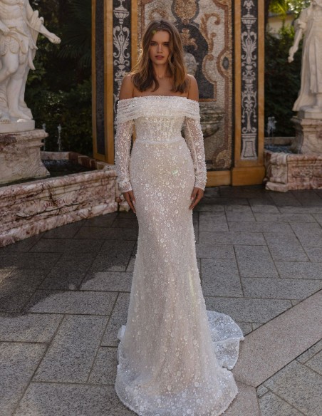 Vestido de novia en pedrería con manga larga y escote bardot
