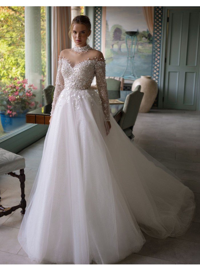 Ivory wedding dress with illusion neckline and...