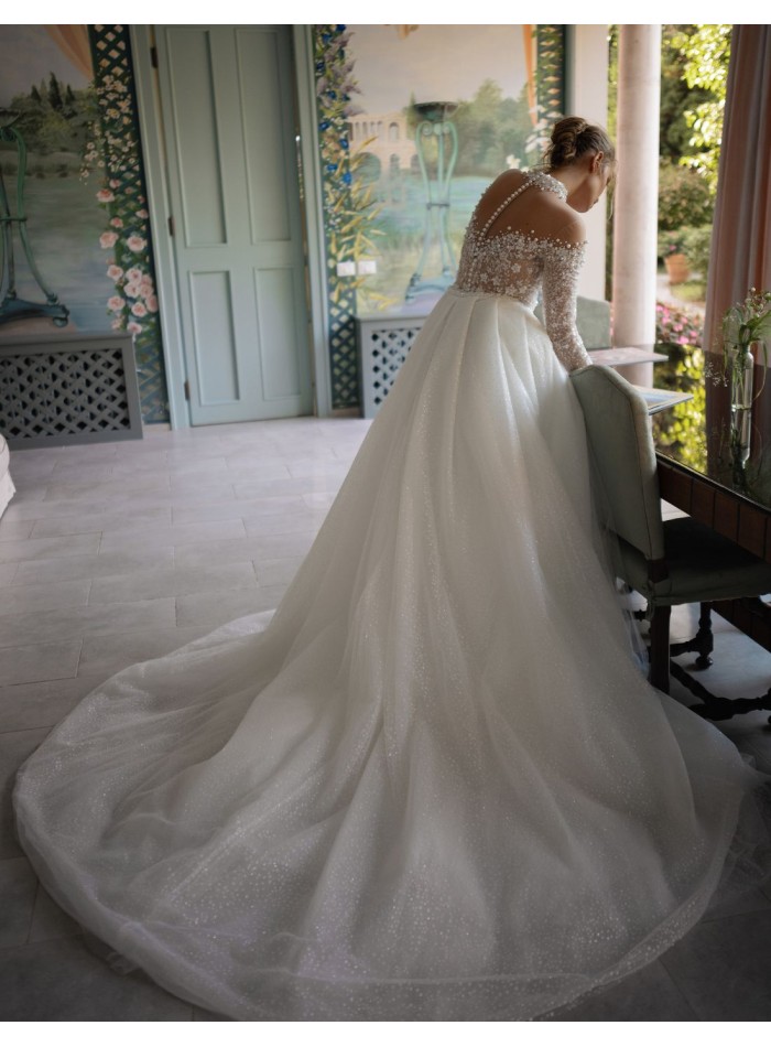Ivory wedding dress with illusion neckline and...