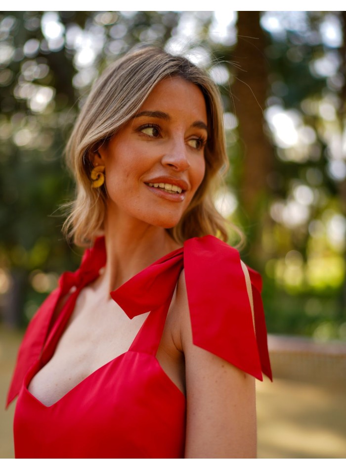 Red midi dress with lacing and ruffle on skirt