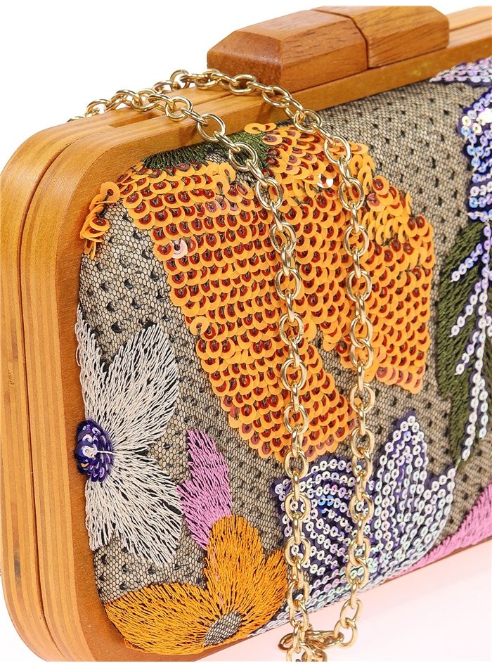 Handbag with hand-stitched floral rhinestones