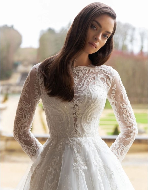 Vestido de novia con corte princesa con mangas efecto tatuaje